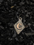 Diamond pendant with initials/brand