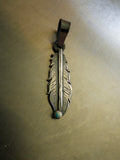 Sterling silver feather pendant