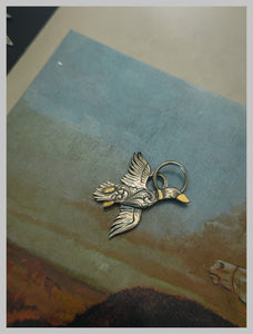 Sterling and 10k gold duck pendant