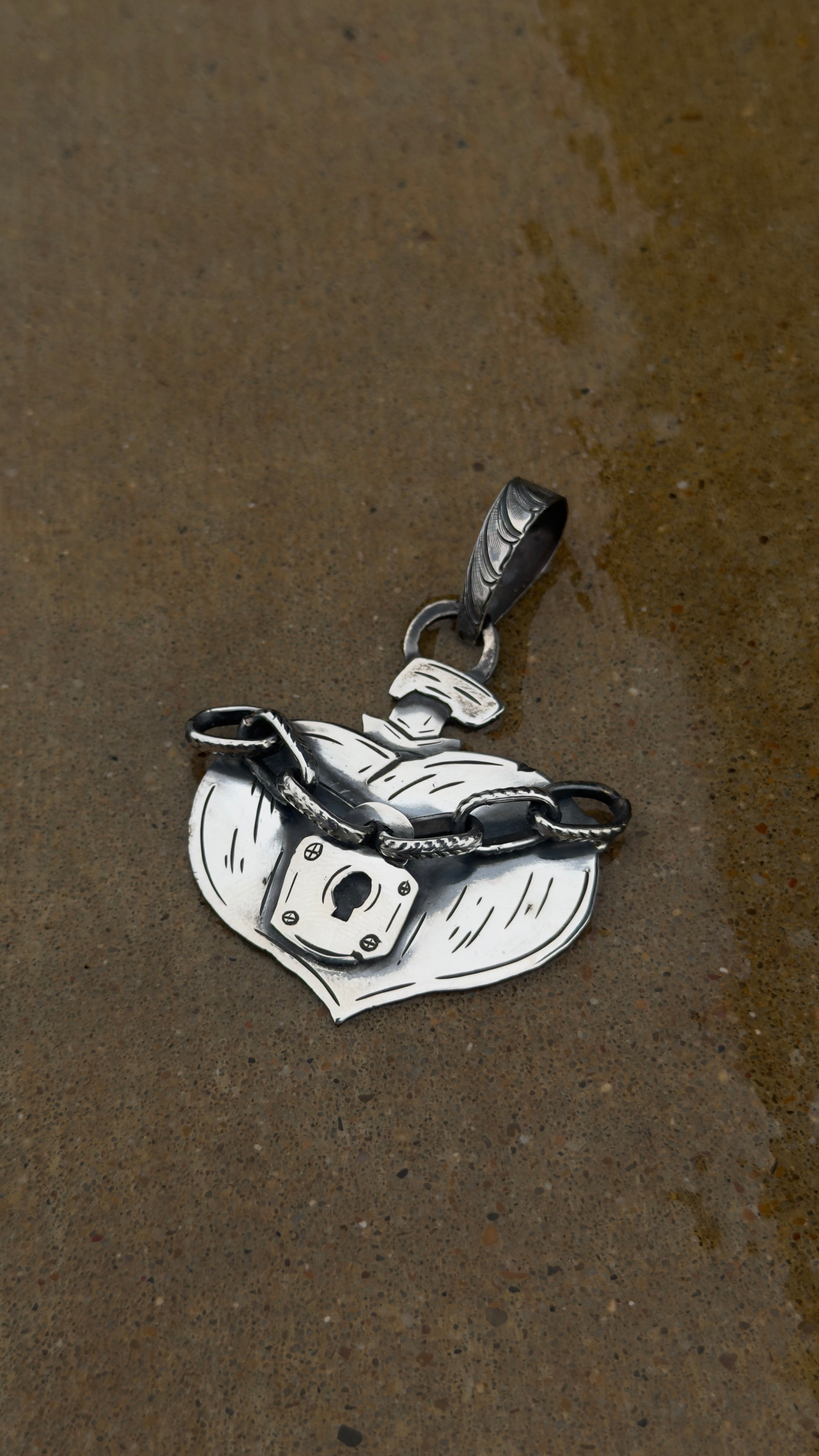 Heart under lock and chain
