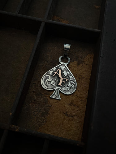 Sterling silver spade pendant with initials or brand